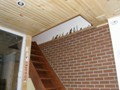 New stairway with brick veneer wall